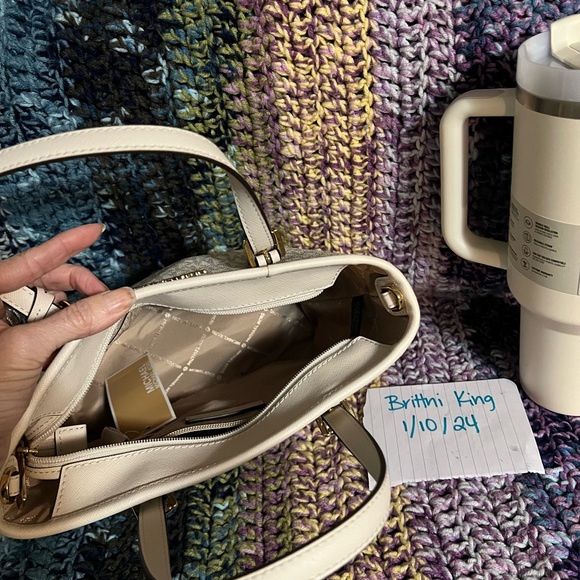 Both new with tags!! Small zip top Michael Kors purse and Cream 40oz Stanley. - Picture 5 of 5